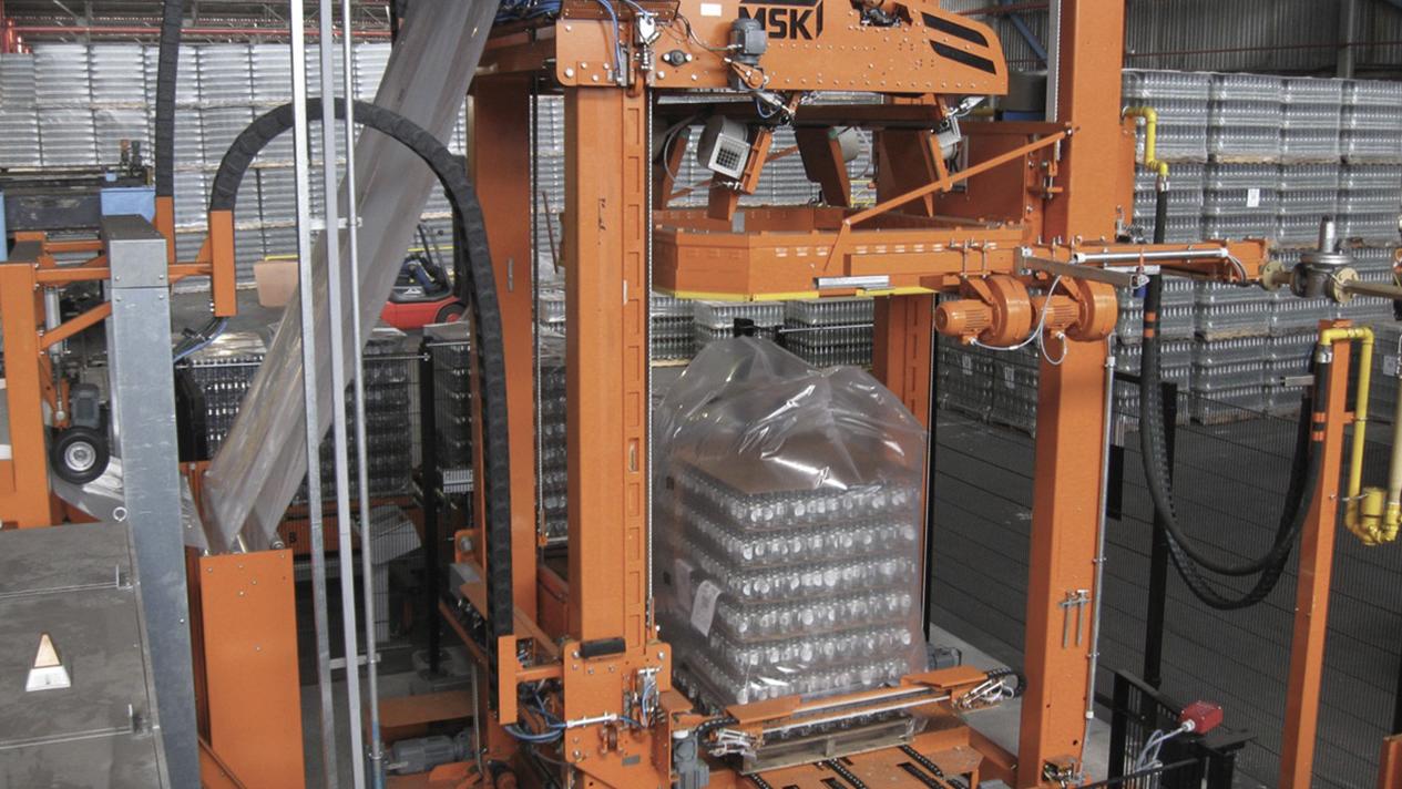 MSK hood shrink systems and processes for glass line packaging lines