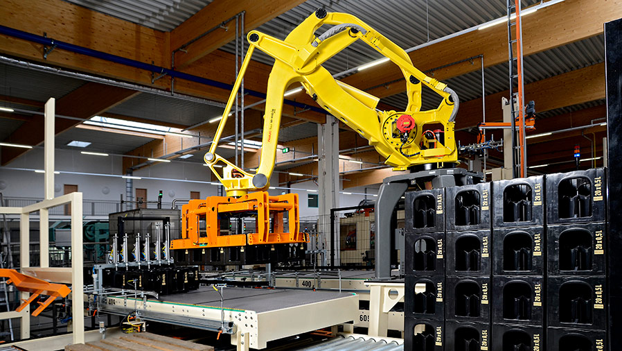 MSK depalletizing system with robot technology for depalletizing plastic crates and with connection to conveyor systems